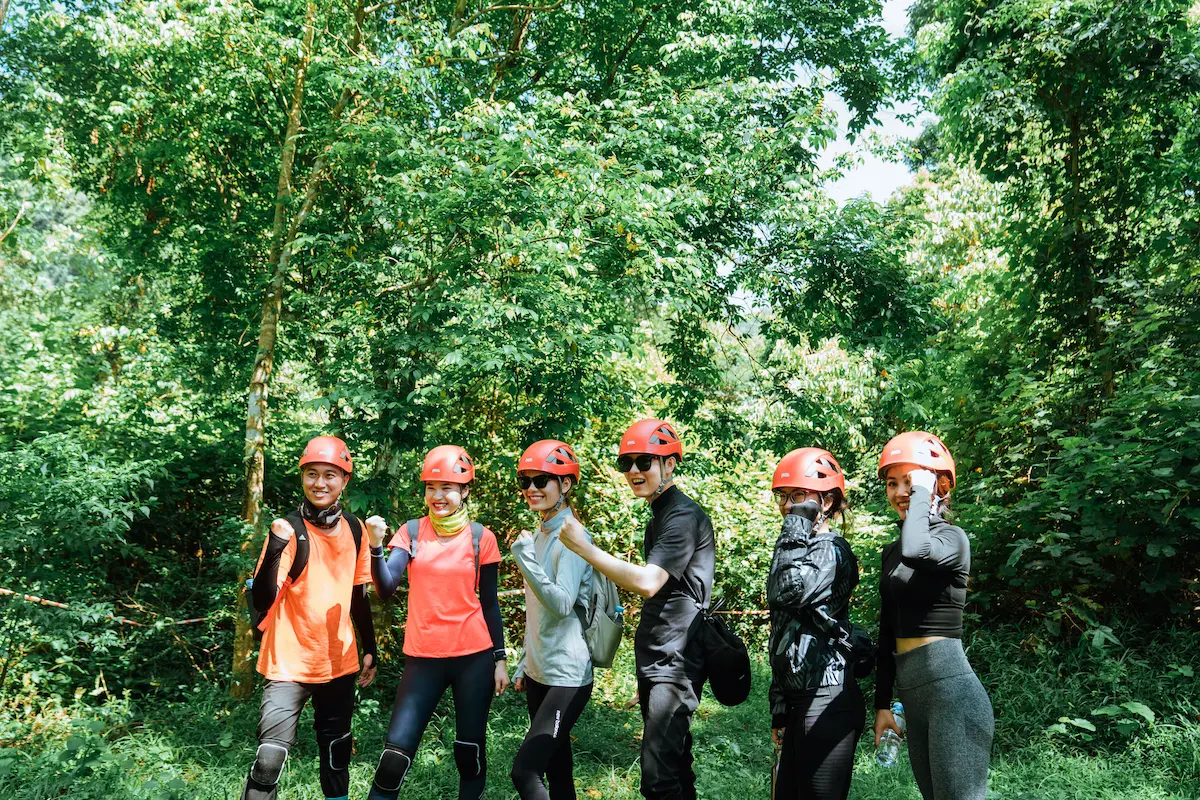 E Cave Phong Nha: Everything You Need to Know 10 Tour group with helmets ready to trek through Abandoned Valley jungle, Phong Nha